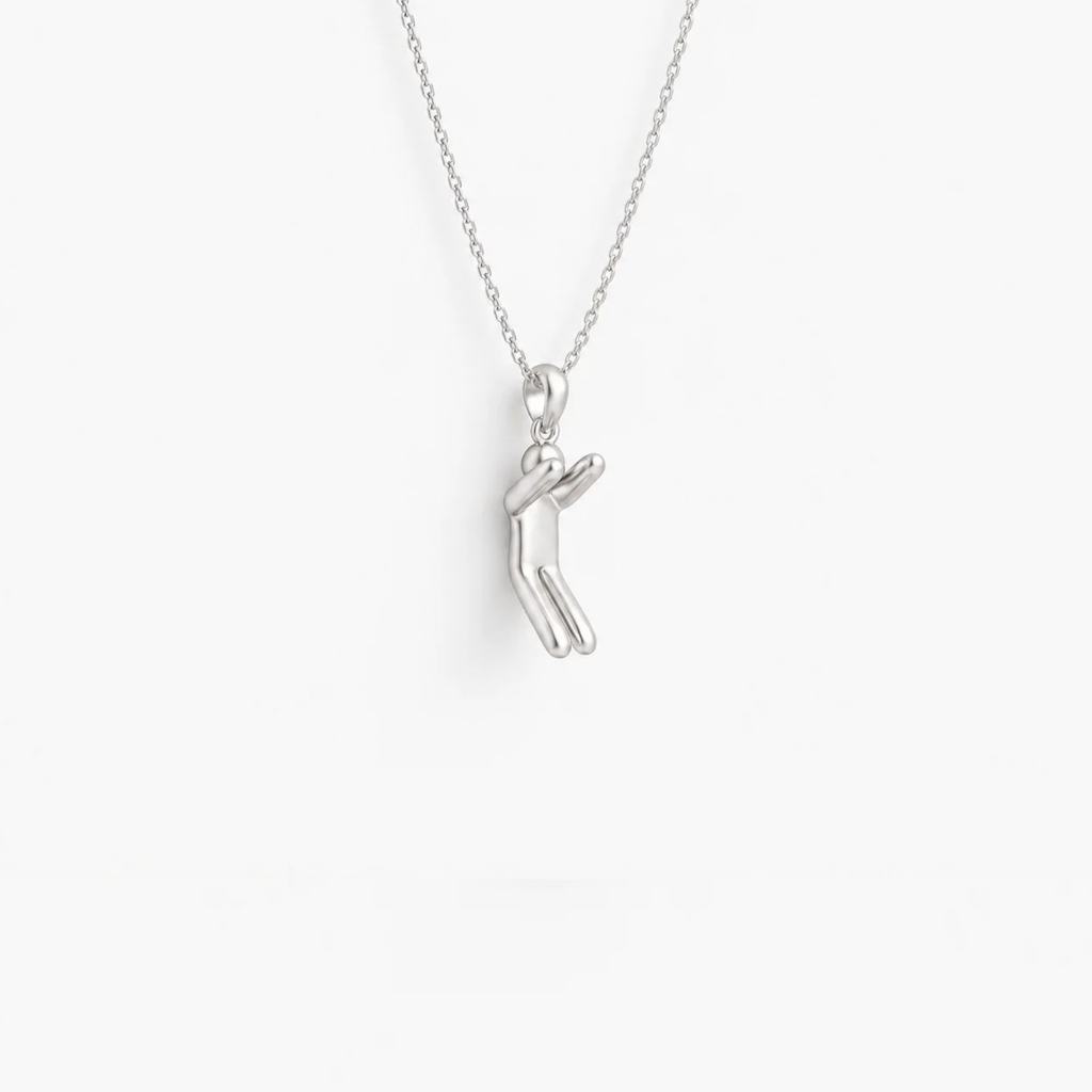 Leaping Figure Pendant in 925 sterling silver, hanging from a fine chain