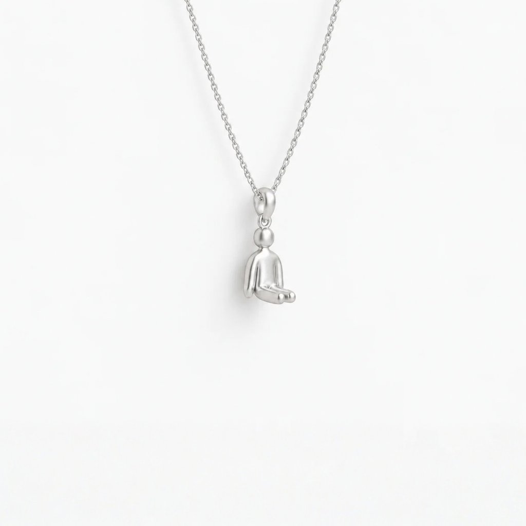 Stillness Figure Pendant in 925 sterling silver, hanging from a fine chain