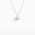 Curled-up Figure Pendant in 925 sterling silver, hanging from a fine chain